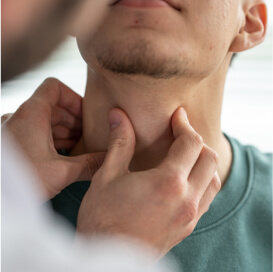 Doctor examining a throat