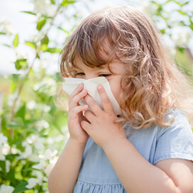 A child blowing their nose